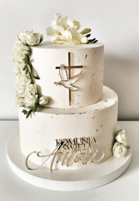 Krzyż z gołębicą i gałązką